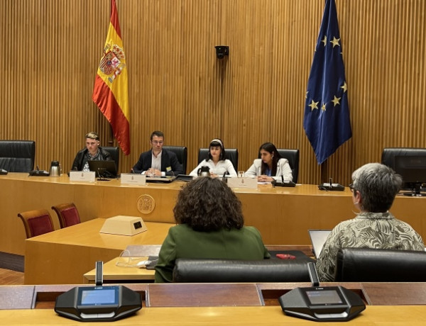 Los tres jóvenes, durante su intervención en el encuentro